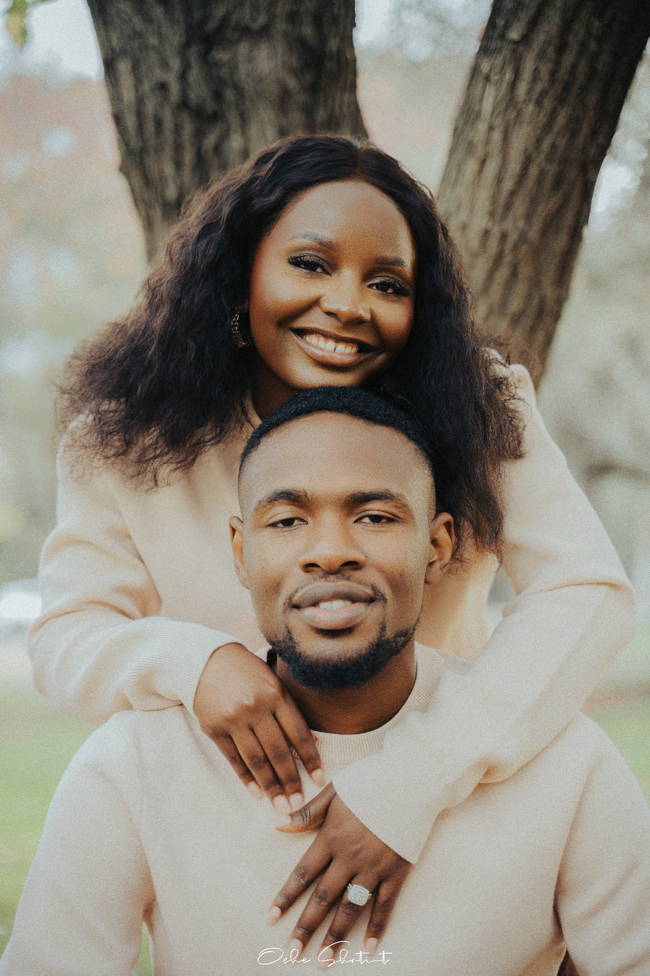 Soft outdoor couple portrait in cream outfits